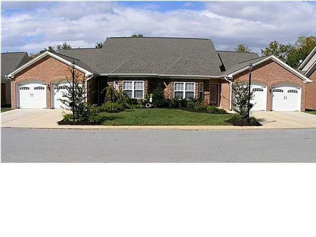 November 2008: the new building, when RE/MAX listed the unit for $239,900 as one of the "beautiful new one level townhomes
